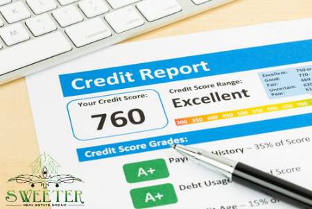 Credit report with pen and keyboard